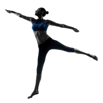 one caucasian woman exercising jumping stretching dancing in silhouette studio isolated on white background