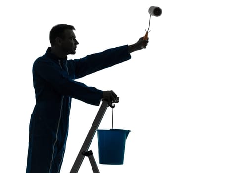 one caucasian man house painter worker silhouette in studio on white background
