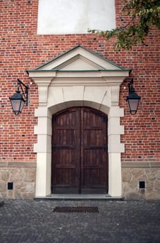 Antique wooden building front door.