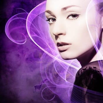 Beautiful,young woman with threads of light in the background