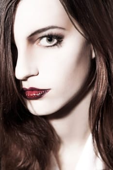 Beautiful young woman looking at camera