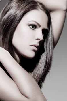 Beautiful young woman with shiny,healthy hair and perfect makeup