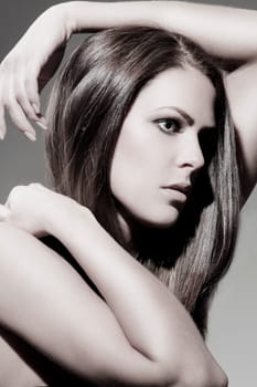 Beautiful young woman with shiny,healthy hair and perfect makeup
