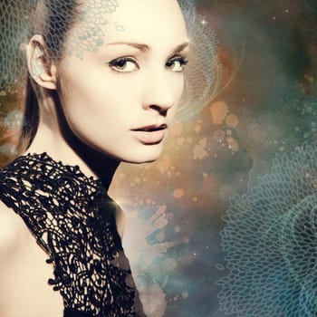 Beautiful young woman in front of a grunge background