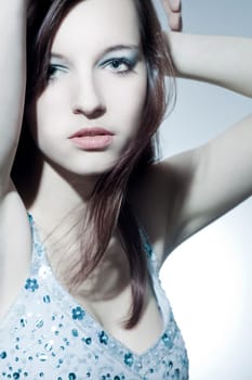Beautiful young woman with healthy,shiny hair and makeup