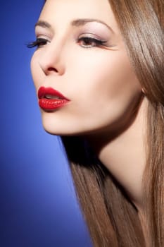 Beautiful young woman with perfect makeup and healthy hair