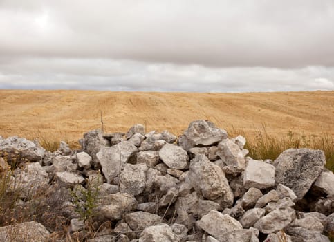 Stonewall in cloudy spanish countryside