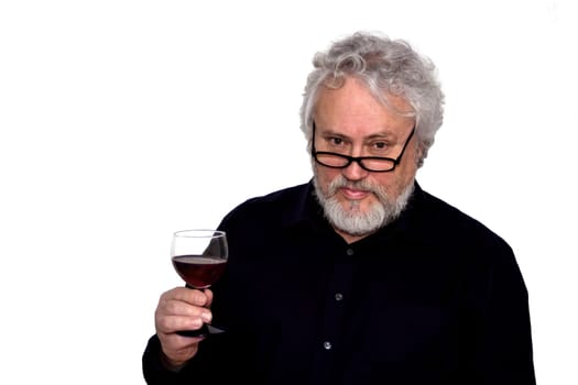 A senior is doing wine tasting