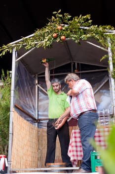 Race of the pouring of Asturian cider, Gijon - Asturias. 27 August 2010.http://www.asturiasdefiesta.es/xix-fiesta-de-la-sidra-natural-en-gijon-2010http://www.asturiashoy.es/periodico/ocio/fiesta_de_la_sidra_natural_de_gij243n_asturias-6523.html