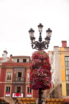Flower decoration on a street light in Gijon, Asturias
