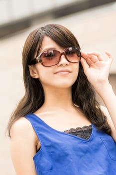 Asian beauty in daytime in modern street in Taipei, Taiwan, Asia.