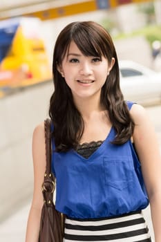 Asian beauty in daytime in modern street in Taipei, Taiwan, Asia.