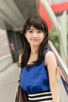Asian beauty in daytime in modern street in Taipei, Taiwan, Asia.