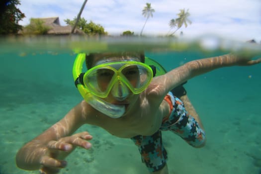 Close-up of snorkeling boy underwater