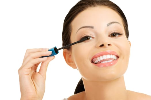 Close up of woman face with mascara brush