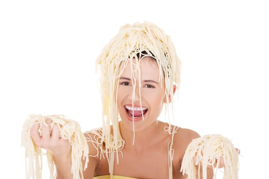 Young beautiful woman with spaghetti noodles on her hairs