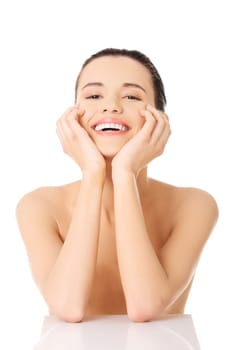 Portrait of a beautiful happy female model on white background