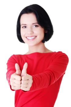 Attractive young student woman gesturing OK, isolated on white