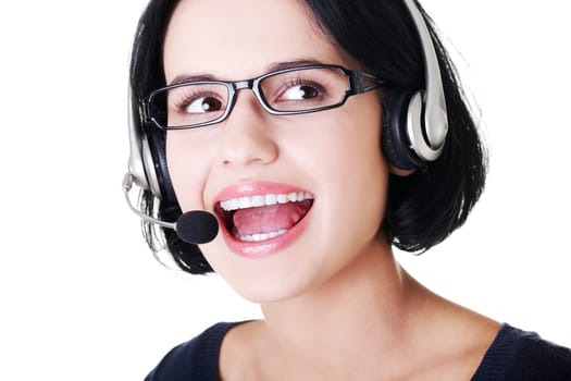 Closeup of attractive customer support representative smiling with headset