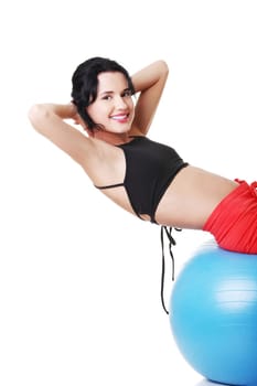 Beautiful young healthy lifestyle woman with pilates exercise ball.