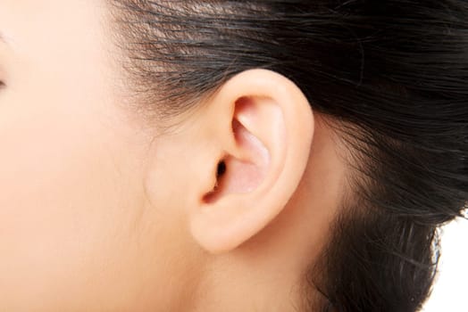 Young caucasian woman ear closeup.