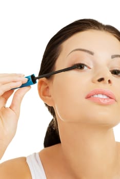 Close up of woman face with mascara brush