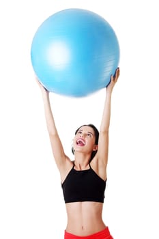 Beautiful young healthy lifestyle woman with pilates exercise ball.