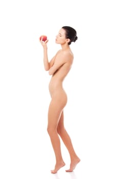 Happy fit nude woman with apple, isolated on white. Healthy life, siet and nutrition concept.