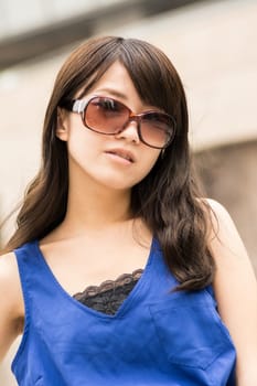 Asian beauty in daytime in modern street in Taipei, Taiwan, Asia.