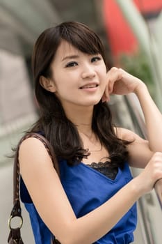 Asian beauty in daytime in modern street in Taipei, Taiwan, Asia.
