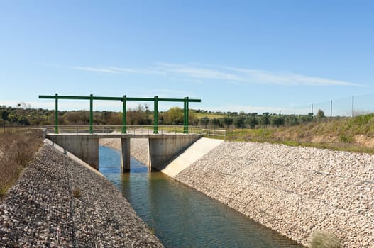 Almost finished sluice gate in the water diversion canal upstream the Alvito reservoir near Oriola village, part of the Alqueva Irrigation Plan, Alentejo, Portugal