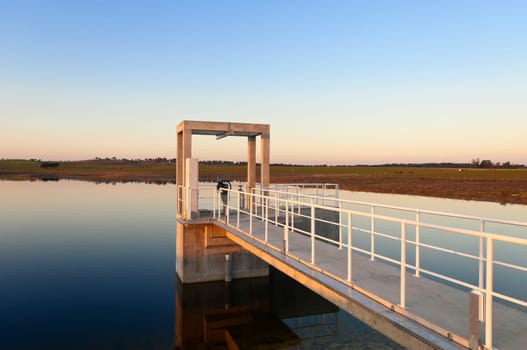 Outlet tower in a small irrigation dam, part of the Alqueva Irrigation Plan, Alentejo, Portugal