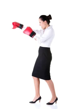 Young businesswoman with boxing gloves, isolated on white background