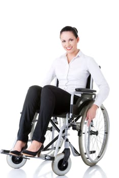 Attractive smiling disabled businesswoman sitting in a wheel chair isolated on white