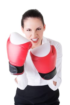 Young businesswoman with boxing gloves, isolated on white background