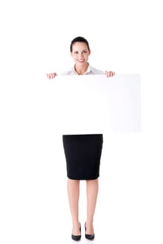 Smiling young business woman showing blank signboard, over white background isolated