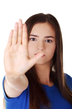 Confident woman making stop gesture sing with hand