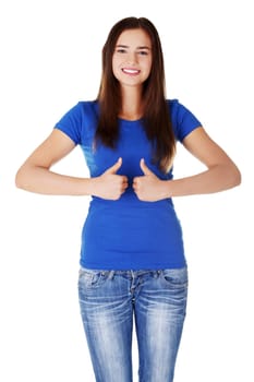 Young student woman gesturing OK , isolated on white.