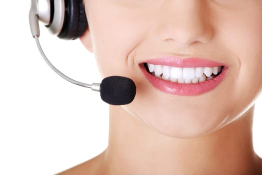 Beautiful young call-center assistant smiling , isolated