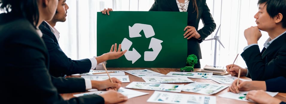 Group of business people planning and discussing on recycle reduce reuse policy symbol in office meeting room. Green business company with eco-friendly waste management regulation concept.Trailblazing