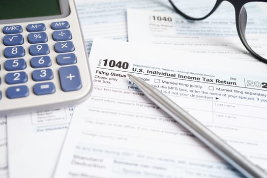 Tax form 1040 U.S. Individual Income Tax Return, business finance concept.