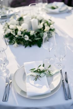 Festive set table with invitations on plates. High quality photo