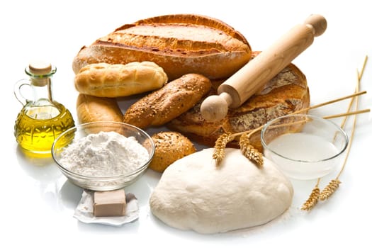 ingredients for homemade bread on white background