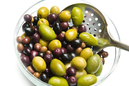 different kind of green and black olives on white background