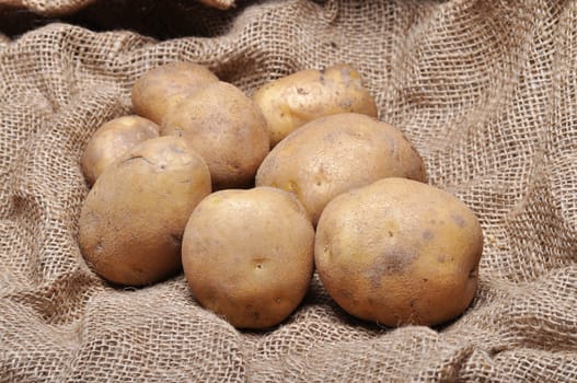 potatoes on burlap sack