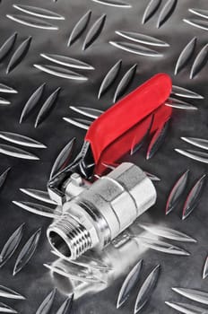 water hydrant on metal surface