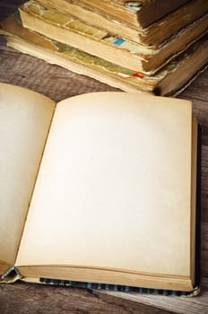 open old book on a wooden surface