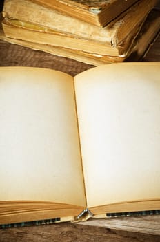 open old book on a wooden surface