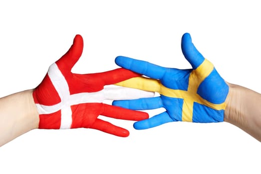 two hands painted in the colors of denmark and sweden shaking