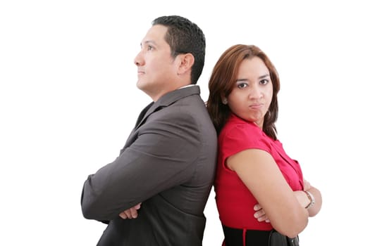 Young couple standing back to back having relationship difficulties on white background
